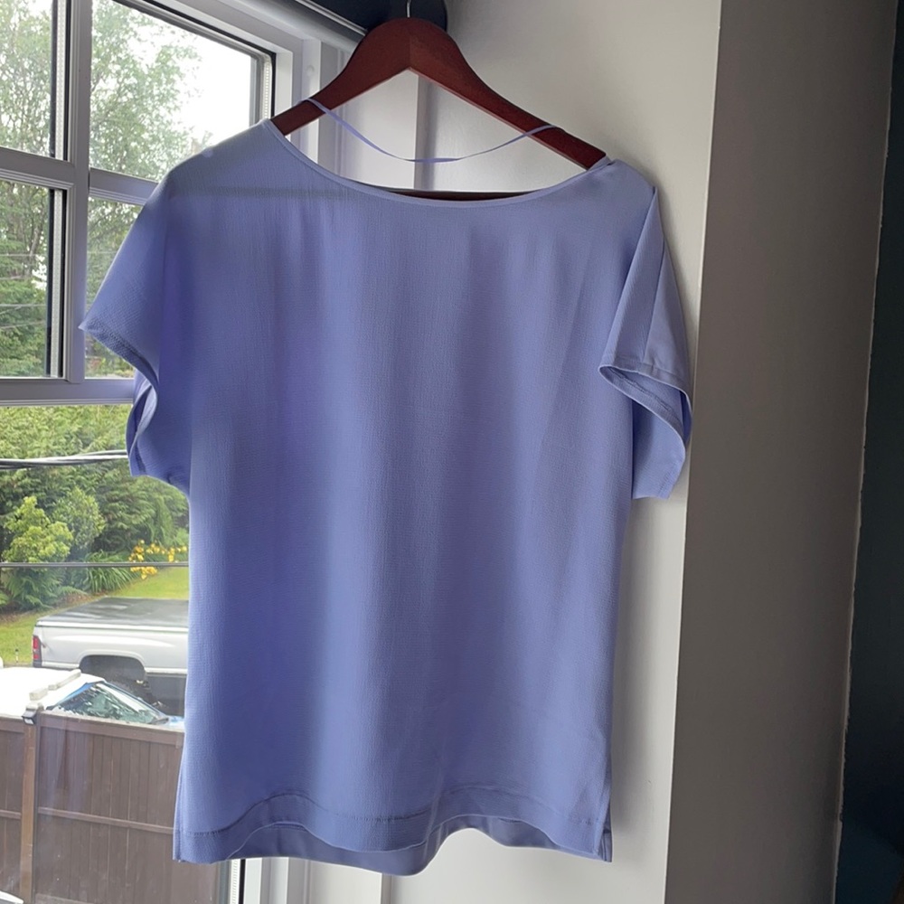 Periwinkle dress top, slouchy fit.